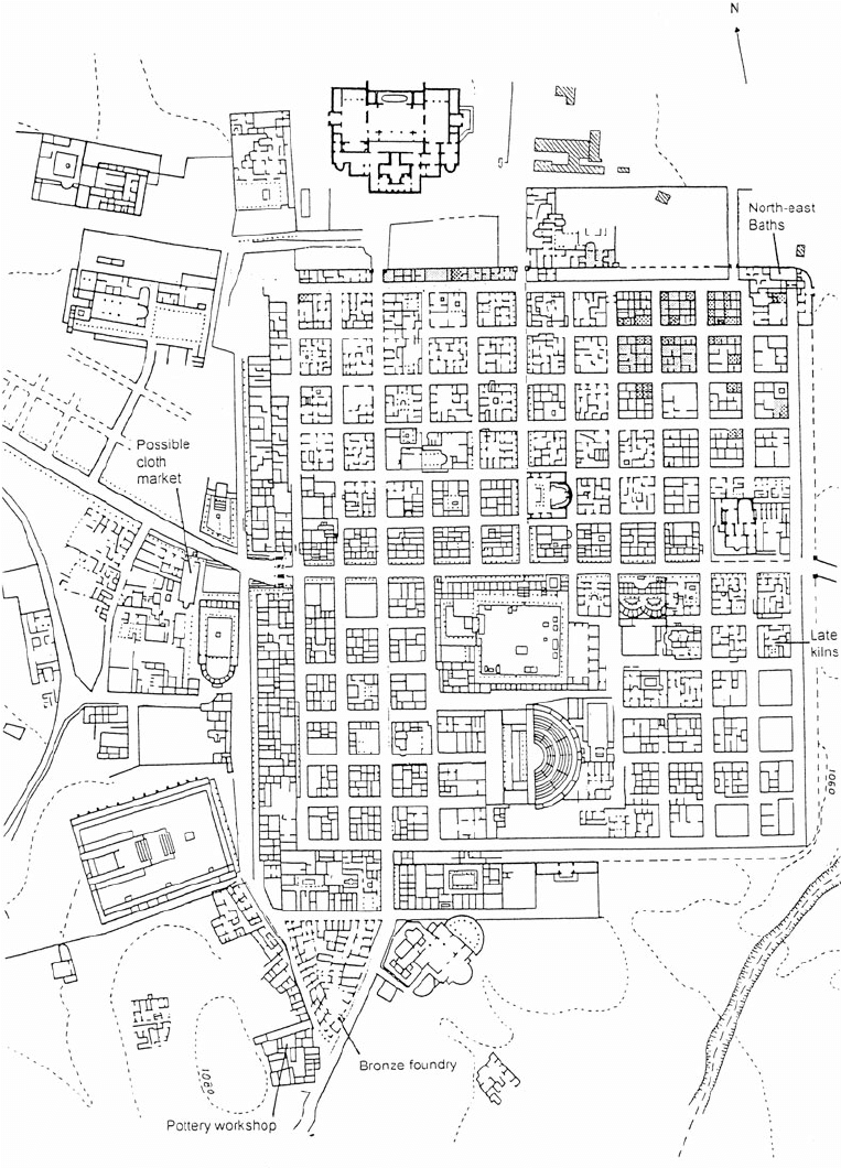 A city plan of Timgad showing its dense rectilinear grid of insulae, with workshops and other functional buildings labeled around the periphery, including a pottery workshop, bronze foundry, possible cloth market, late kilns, and the North-east Baths.